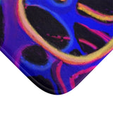 Strands of a rainbow bath mat